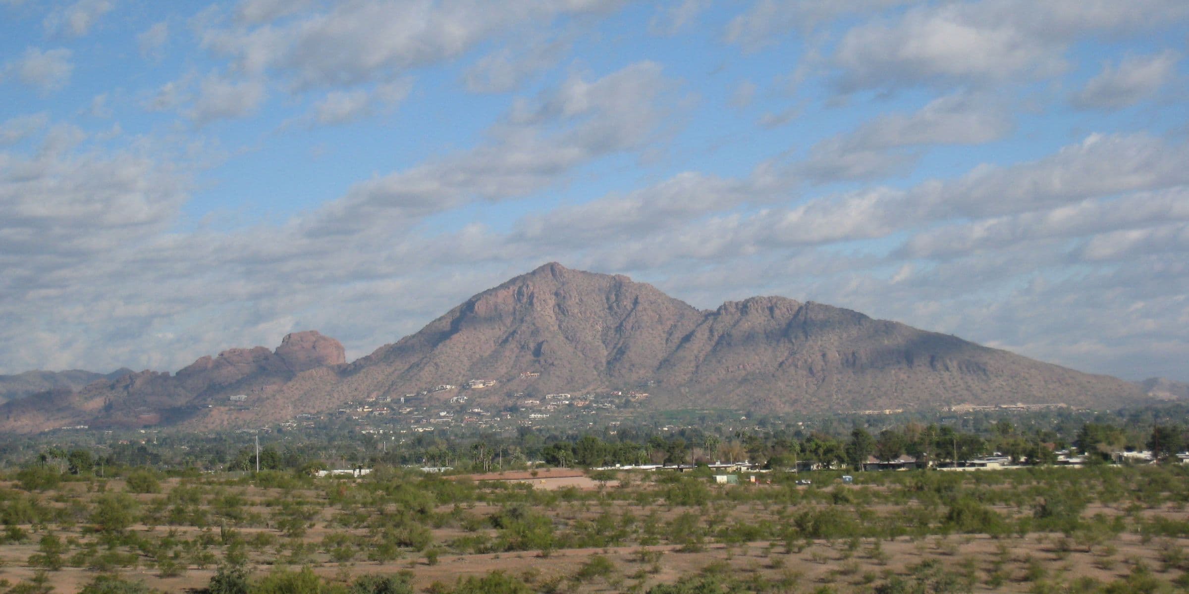 Camelback Mountain rising above the Phoenix skyline, viewed from the east valley