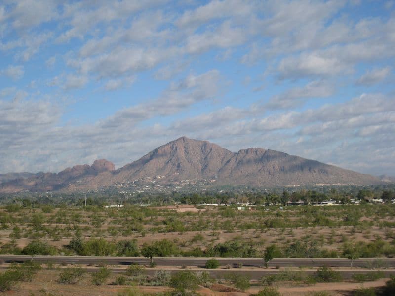 Camelback Mountain rising above the Phoenix skyline, viewed from the east valley